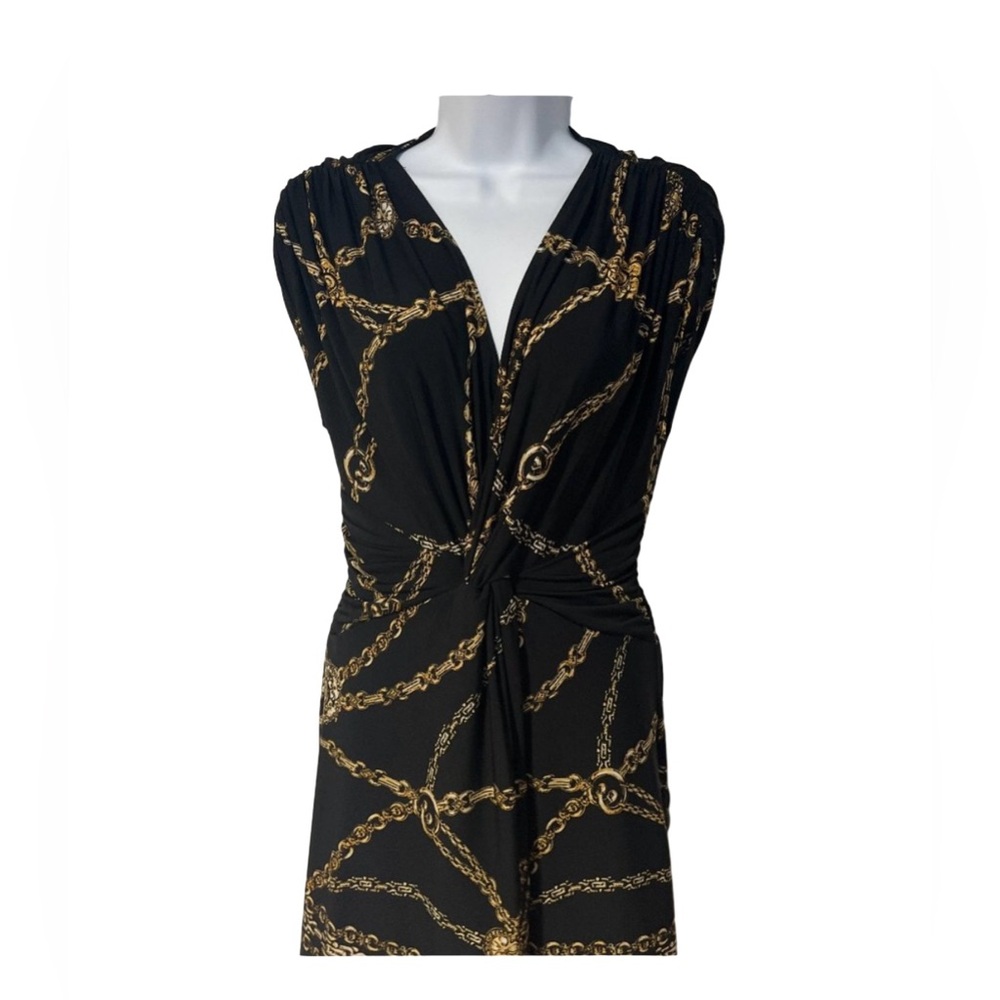Cache stylish and sexy black and gold mini dress